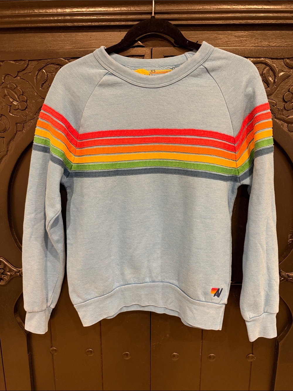 Aviator Nation Light Blue Crewneck with Rainbow Chest Stripes